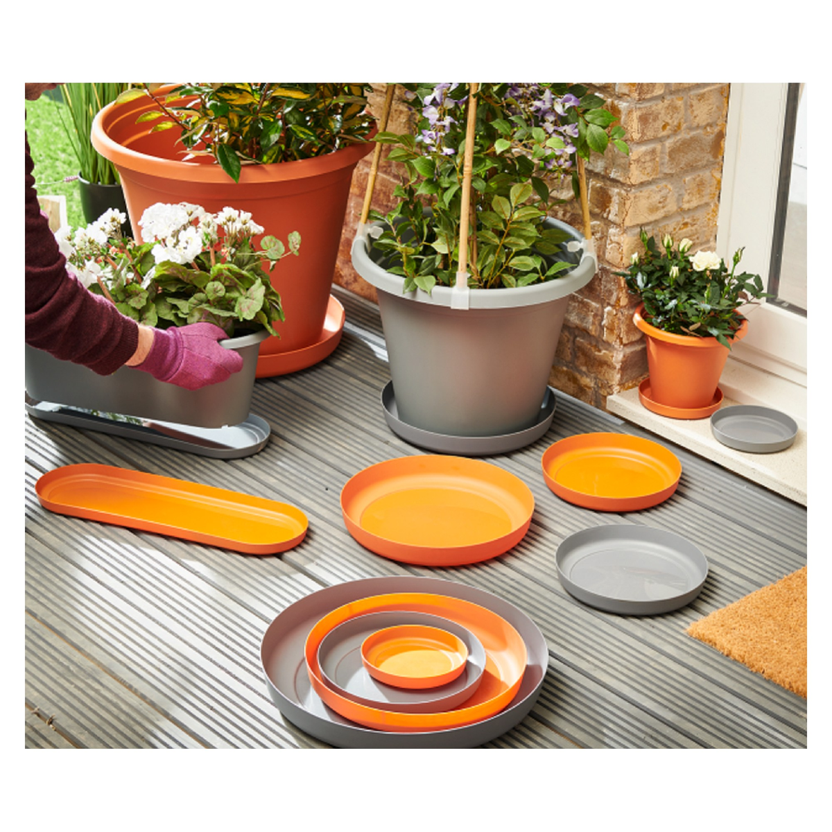 Pack of five Clever Pots 9cm terracotta saucers, view 4