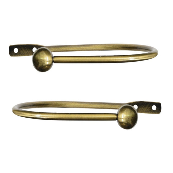 Jones Interiors Cosmos metal holdback antique brass